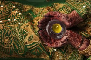 What is henna or mehndi and what does it do?